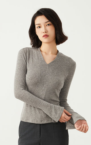 Gray Tencel wool V-neck long-sleeve top, fitted silhouette and curved seam lines