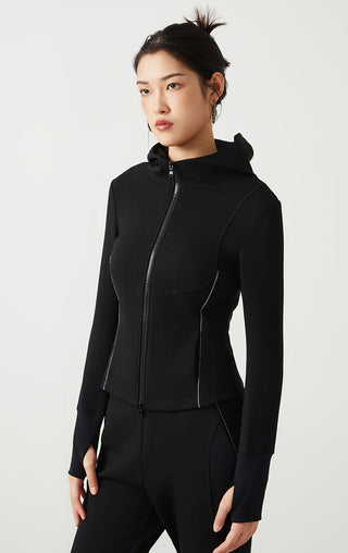 Black zip-front hoodie with raised hood and long sleeves; visible front zipper seams