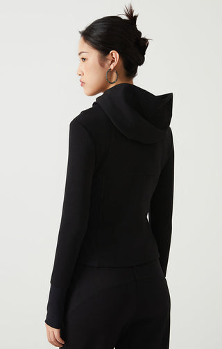 Back view of black zip-front hoodie with hood and long sleeves; no visible branding