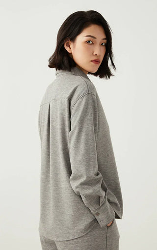 Light gray overshirt side view, button cuffs and long sleeves, tailored fit
