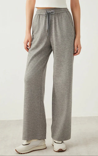 Light gray wide-leg pants with drawstring elastic waistband and wide straight legs