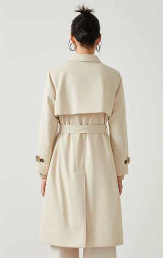 Back view camel mid-length belted coat with button closures and yoke seams