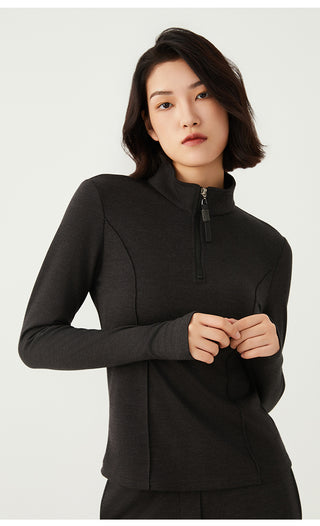 Dark gray knit half-zip top with stand collar and beaded zipper pull, long sleeves