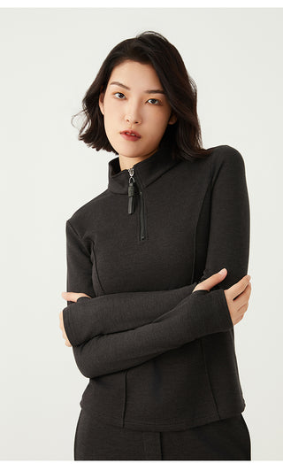 Dark gray long-sleeve knit half-zip top; stand collar with beaded zipper pull