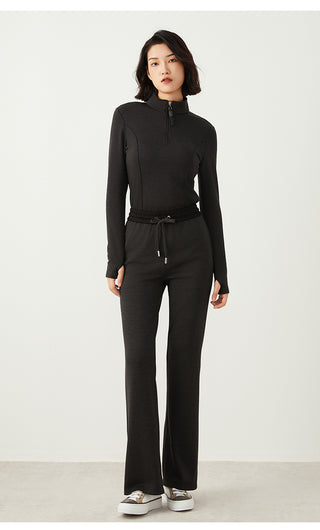 Dark gray knit half-zip top with beaded pull tab and stand collar, long sleeves