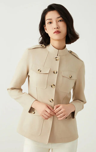 Camel utility jacket with front buttons, flap chest pockets, and lightly tailored seams