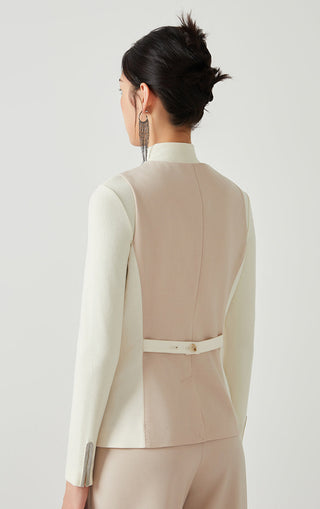 Camel back view of tailored wool-blend vest with buttoned V-neck and belt detail