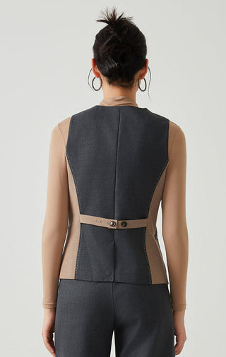 Dark gray back view of tailored vest with V-back seam and waist belt detail
