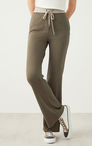 Army green wide-leg pants with drawstring elastic waistband and long, straight fit