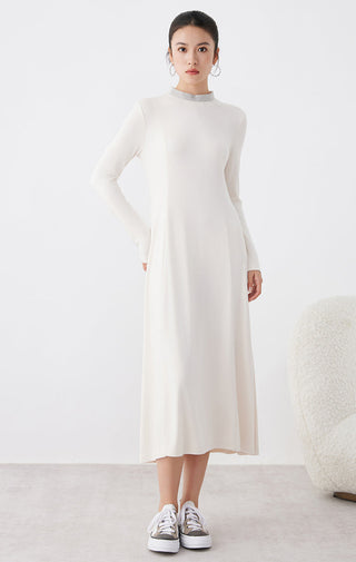 White long-sleeve midi dress, high neckline and subtle drape from waist to hem
