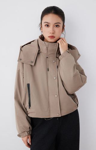 Oversized hooded puffer jacket in dark khaki with snap buttons and front zip