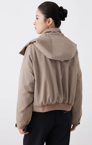Dark khaki oversized hooded puffer jacket back view with adjustable hem