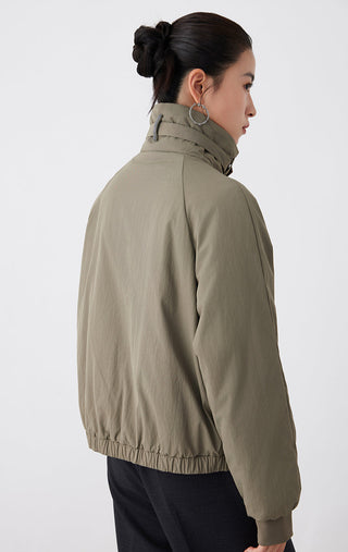 Army green utility jacket back view: stand collar, gathered cuffs, elastic hem