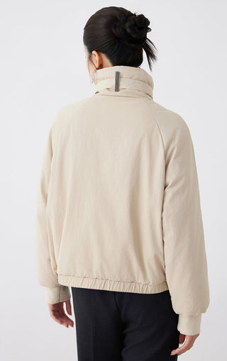 Apricot utility jacket back view: stand collar with leather strap detail, gathered hem