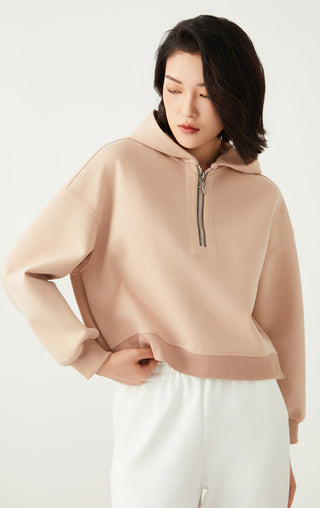 Khaki half-zip hoodie with beaded pull tab and drawstring hood, relaxed fit
