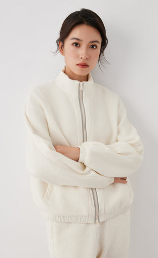 White wool bomber-style jacket with center zipper and elastic cuff and hem
