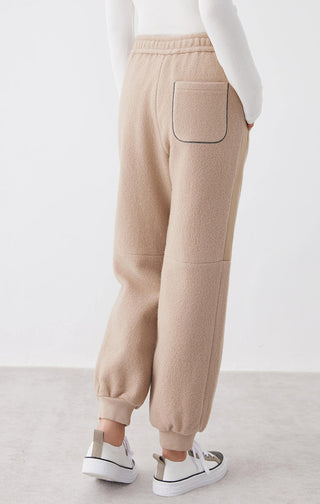 Camel wool jogger pants with back pocket detail and relaxed tapered fit