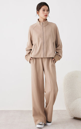 Khaki stand-collar zip jacket with matching jogger-style pants, full body view