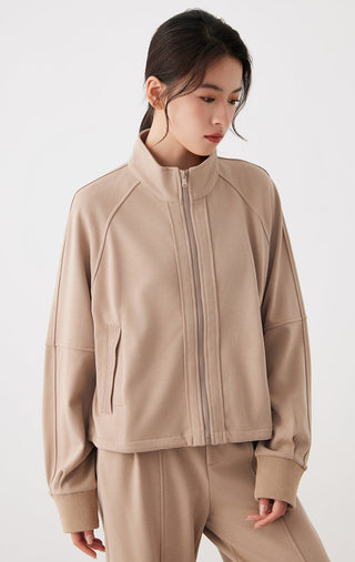Khaki stand-collar zip jacket with vertical seam pockets and ribbed hem cuffs