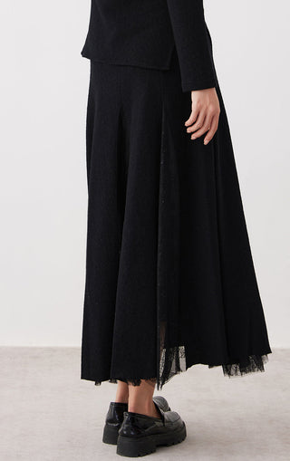 Black wool-cotton midi skirt with lace-trimmed hem and panelled drape