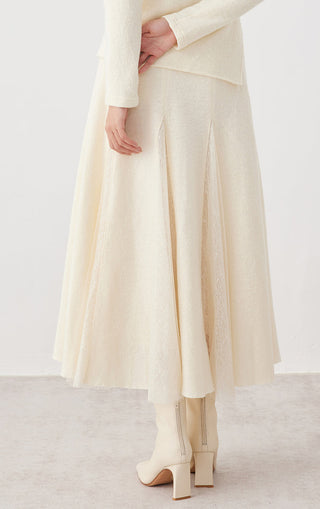 Beige panelled lace midi skirt with soft drape and textured lace at the hem