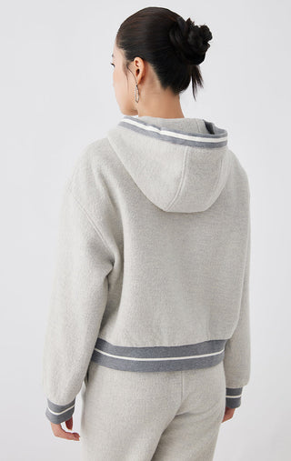 Light gray wool hooded zip jacket, back view with striped waistband and cuffs