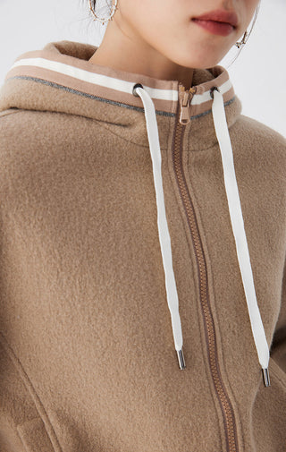 Close-up: camel wool hooded zip jacket with striped neckband and white drawstrings
