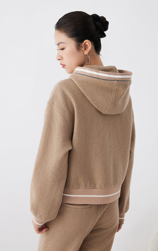 Camel wool hooded zip jacket, back view with striped waistband and hood