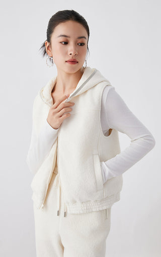 White hooded vest with hood drawcord and front zip, side pocket detail