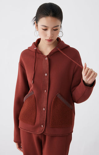 Red hooded cotton-wool jacket, button front with two chest pocket panels