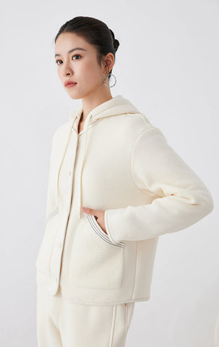 Cream white hooded jacket with button front and side pocket panel detail