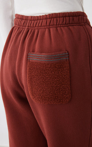 Ankela Red pants back pocket detail with striped trim and elastic waist