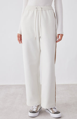 White wide-leg casual pants with elastic waistband and drawstring ties