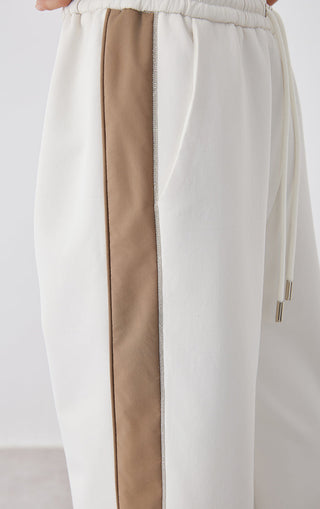 Elastic waist pants in white with tan center colorblock panel seam