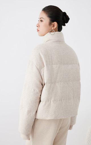 Beige shimmer down jacket, back view with stand collar and puffer silhouette