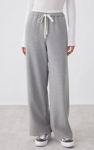 Light gray wide-leg pants with elastic waist and drawstring, cashmere-blend knit