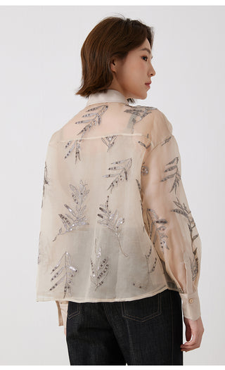 Back view of camel silk button shirt with scattered silver-thread leaf embroidery