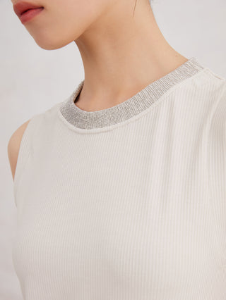 Close-up: white tank top with ribbed knit and sparkling beaded neckline trim
