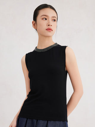 Black ribbed sleeveless tank top with beaded crew neckline, side view