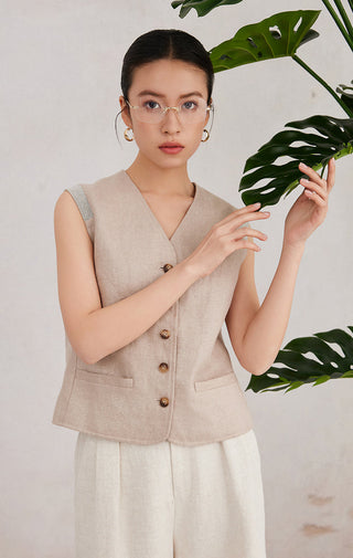 Camel sleeveless vest with V-neck, gold buttons, and flap pockets