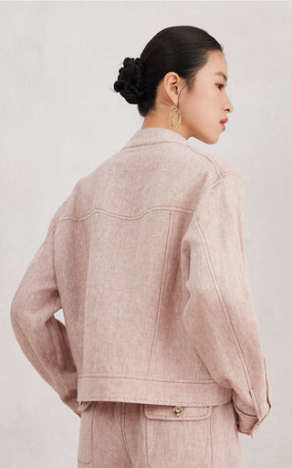Rose linen jacket back view with yoke seam and cuff button detail