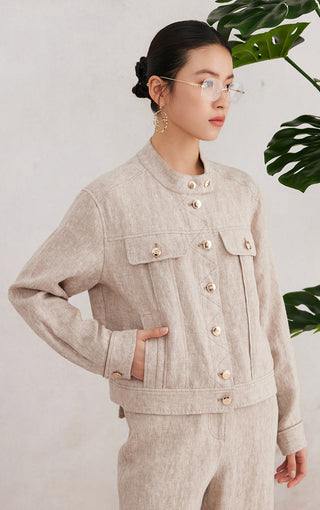 Beige linen jacket with stand collar, button placket, and flap chest pockets