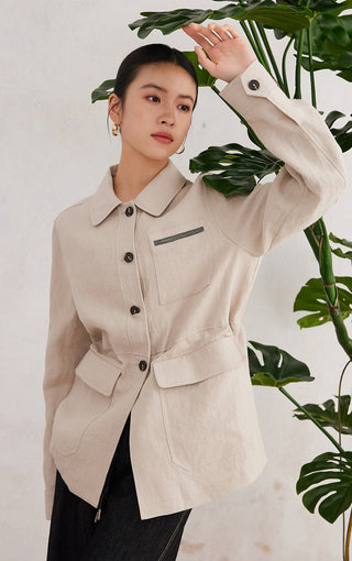 Beige linen utility shirt with button front, flap chest pocket, and belted waist
