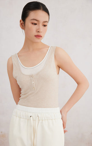 Light gray sleeveless tank with scoop neck and button placket, fitted fabric