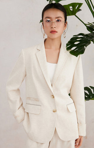 Beige single-breast blazer with flap pocket and gold button detail