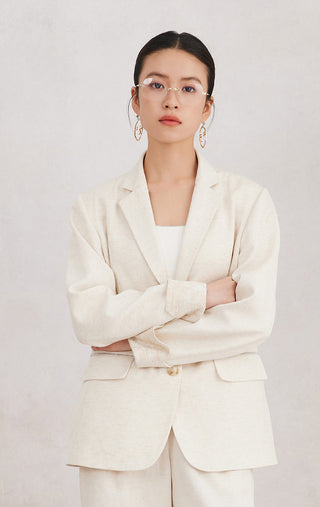 Beige linen-blend blazer with notch lapel, flap pockets, and button front