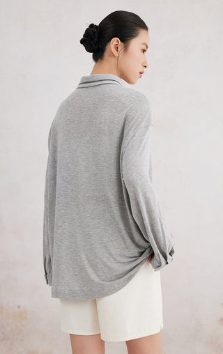 Light gray button-up shirt back view with point collar and long sleeves