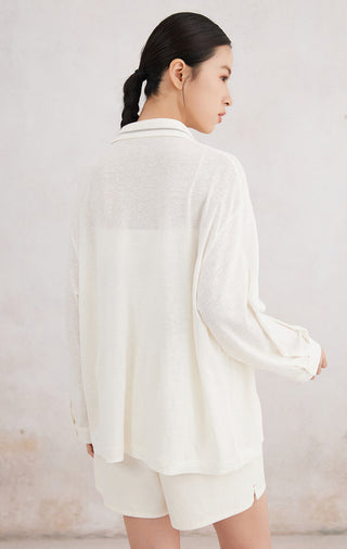 White button-up shirt, back view with point collar and long sleeves, beaded collar detail