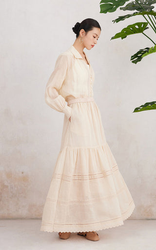 Beige ramie tiered maxi skirt with elastic waist, layered ruffles, and lace-edged hem