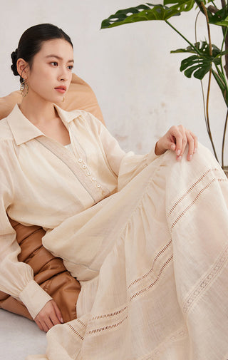 Beige ramie tiered maxi skirt detail: layered ruffles with embroidered stripe trim
